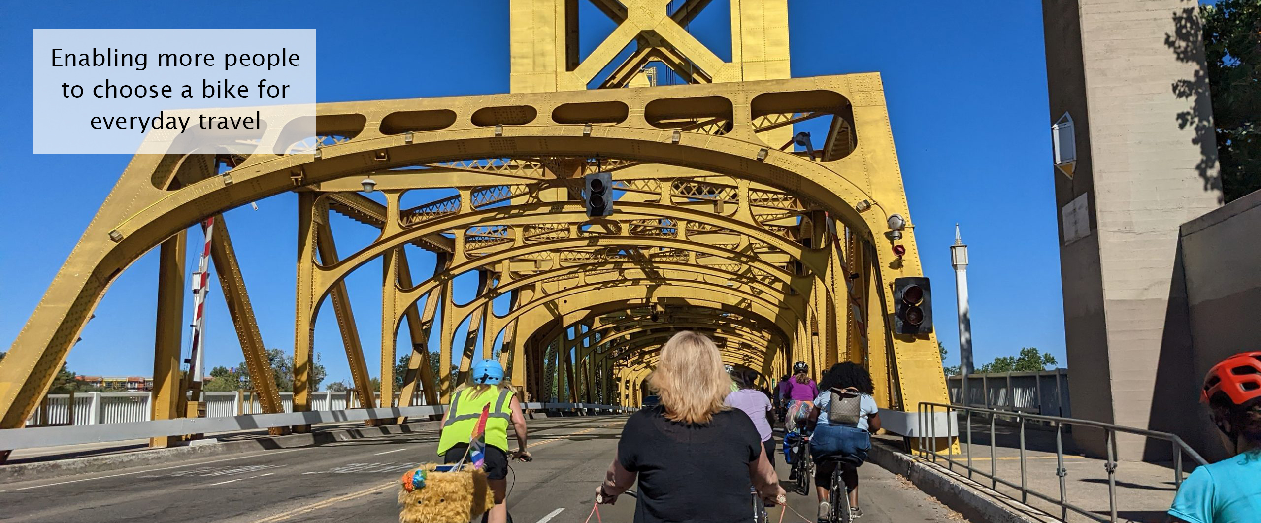 Enabling more people to choose a bike for everyday travel. Cyclists on Sacramento's Tower Bridge.