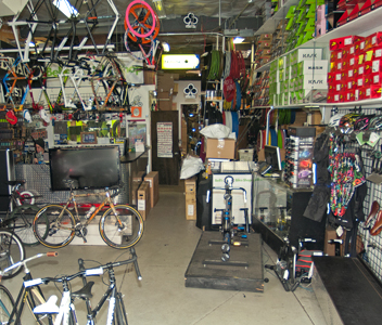 Bikes and bike equipment in a storage room.